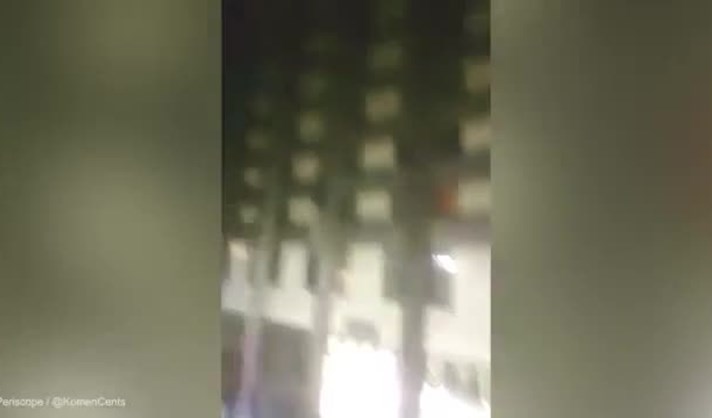 Moradores de torre ardida tentam escapar pelas janelas