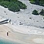 Salvam-se de ilha remota ao escrever na areia