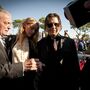 Amber Heard pede mais dinheiro a Johnny Depp