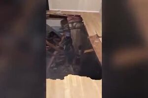 Floor  collapses in an apartment during a large college party.mp4