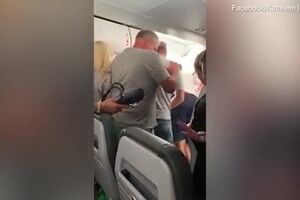 Flight from Mexico erupts into chaos qfter man opens cabin door.mp4