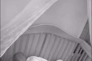 Little girl tucks in pitbull before bed.mp4