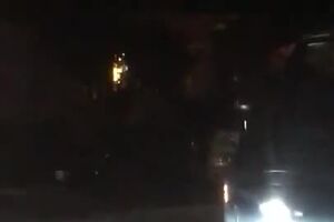 Rumbling Raccoons Hold Up Traffic  ViralHog.mp4