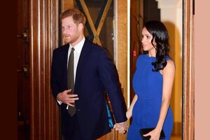  Meghan Markle em cerimónia com Harry