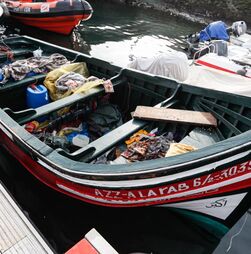Barco com 38 migrantes desembarcou na praia da Boca do Rio no Algarve