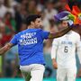 Homem invade campo com bandeira LGBT durante Portugal-Uruguai