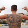 Na Argentina, há quem faça fila para tatuar a cara de Messi