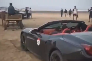 Ferrari California salvo da maré cheia… por um par de bois