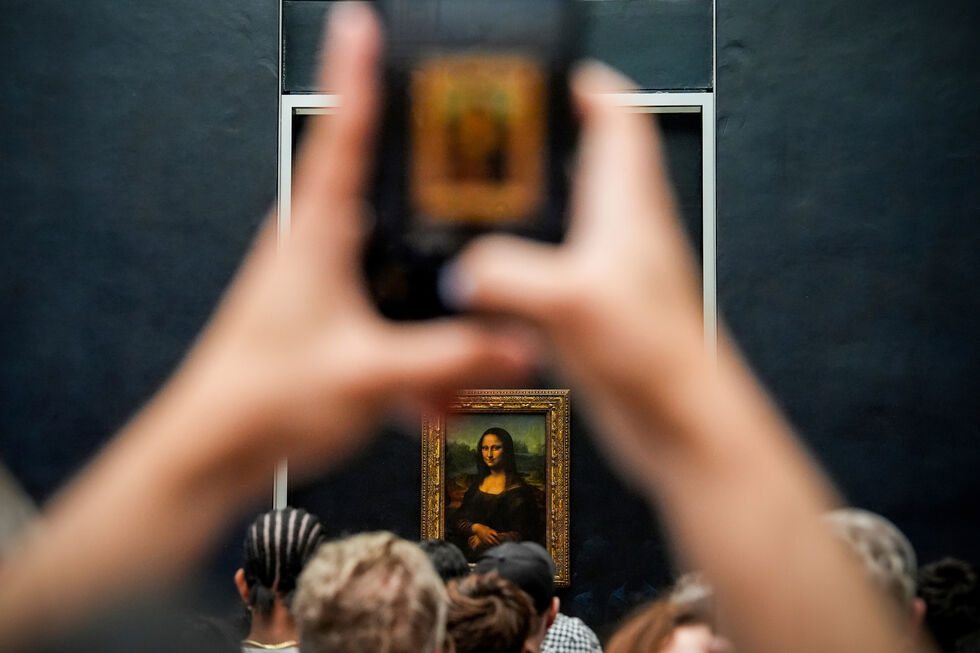 Visita à Mona Lisa, no Museu do Louvre, em Paris