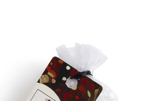 Saquinho ambientador Natura com aroma a maçã e canela, ideal para o Natal