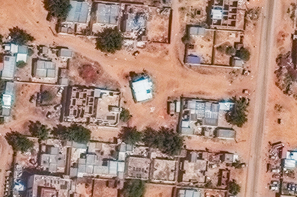 Vista aérea da cidade no Sudão, após os combates