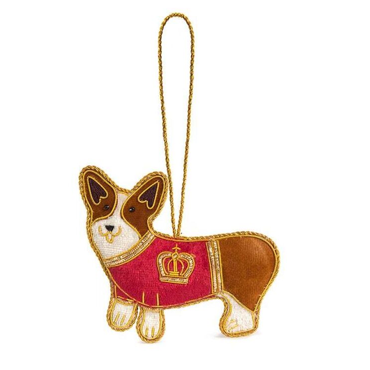 Enfeite de Natal com corgi e coroa, alusivo a Carlos III, à venda por €97