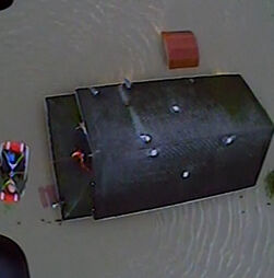 Moradores resgatados de helicóptero durante cheias históricas em Washington 