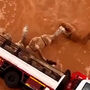 Imagens mostram camelos no meio das cheias após camião que os transportava tombar na Arábia Saudita