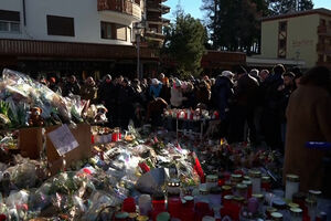 Centenas de pessoas homenageiam as vítimas do incêndio num bar suíço 
