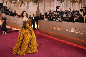 A atriz Parker Posey