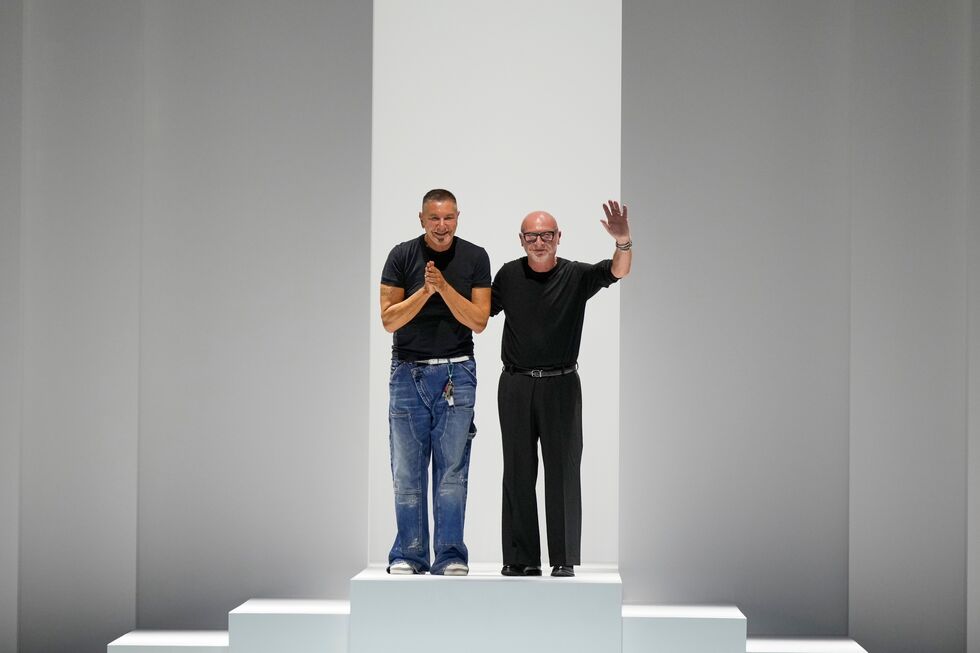 Designers Stefano Gabbana, left, Domenico Dolce accept applause