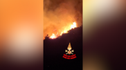 <![CDATA[ Incêndio florestal junto ao Lago de Garda em Itália ameaça casas e obriga a retirar 200 pessoas ]]>