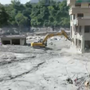 NOW no Nepal: Autoridades tentam recuperar cofre de banco que ficou destruído