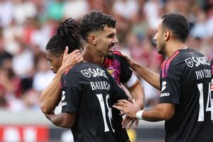 Jogadores do Benfica celebram após vitória sobre o Marítimo