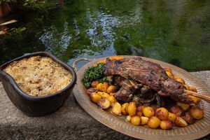 Anho assado com arroz do forno Baião